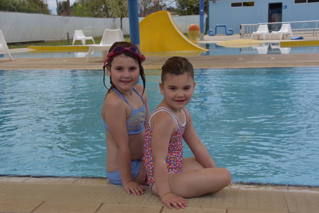 Ava and Ebony Percy were enjoying a morning swim at the Forbes Olympic Pool on Wednesday.