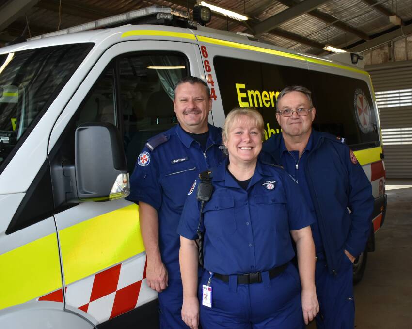Matt White and Station officer Neal Herbert welcome new NSW Ambulance chaplain Danielle Toole to the Forbes ambulance station.