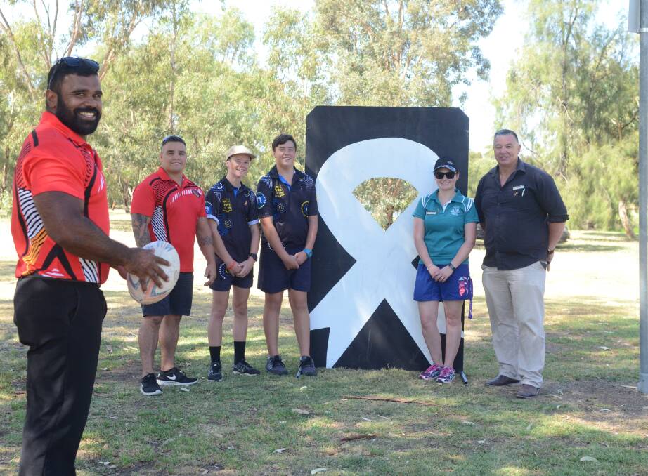 Warren Williams and Steve Taylor from Cowra's Weigelli Centre with Forbes High's Ben Malloy, Ethan Markwort, Tara Morrison and Barry Merritt at the 2017 Ochre Ribbon Day.