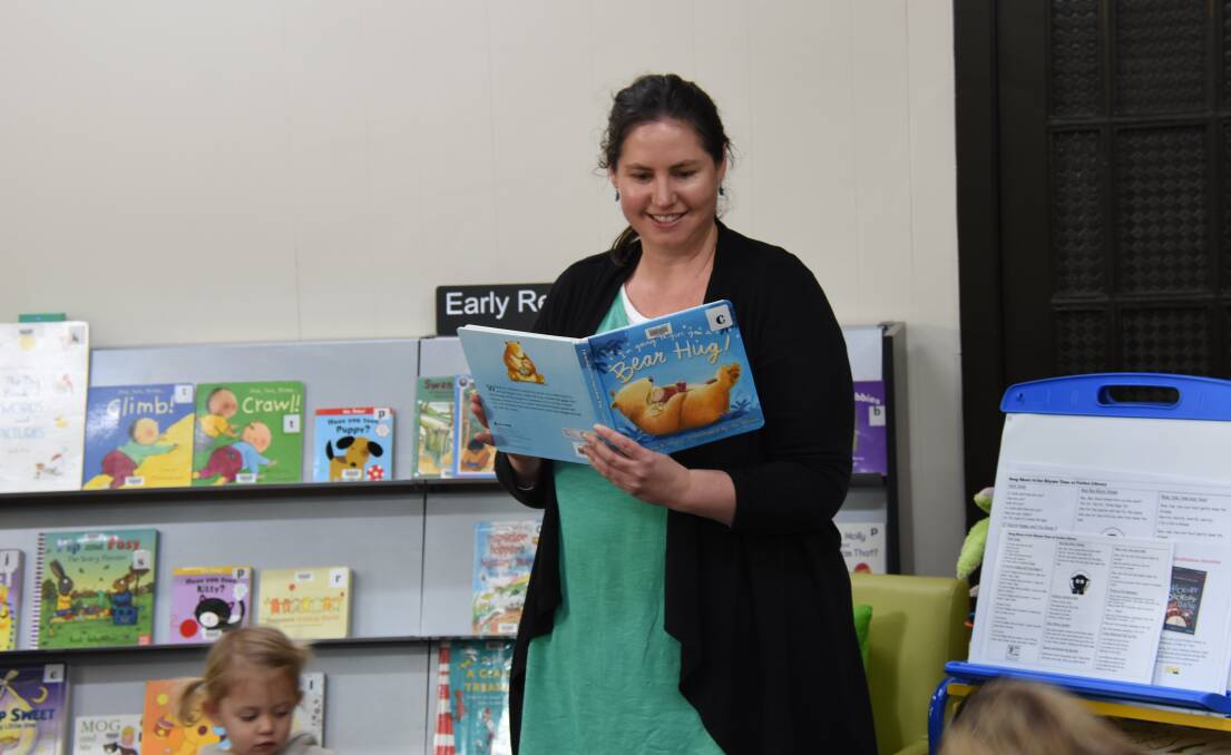 Candice Iyer reading at Forbes Library's fortnightly Storytime. 