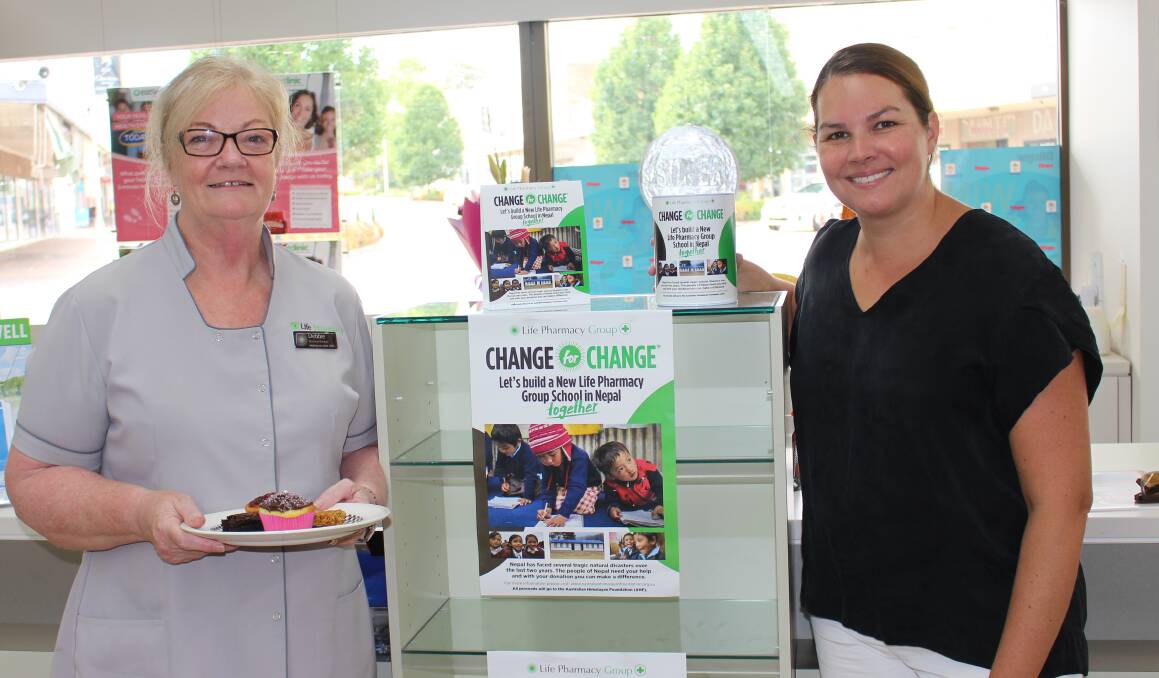 Flannery's business Manager Debbie Prior and owner Sarah Hazell promote Change for Change.