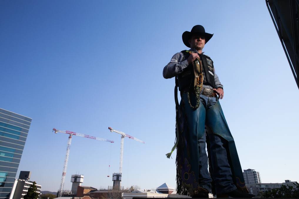 RIDE 'EM COWBOY: Justin Robards will compete at the Professional Bull Riders Newcastle Invitational on Saturday. Picture: Jonathan Carroll