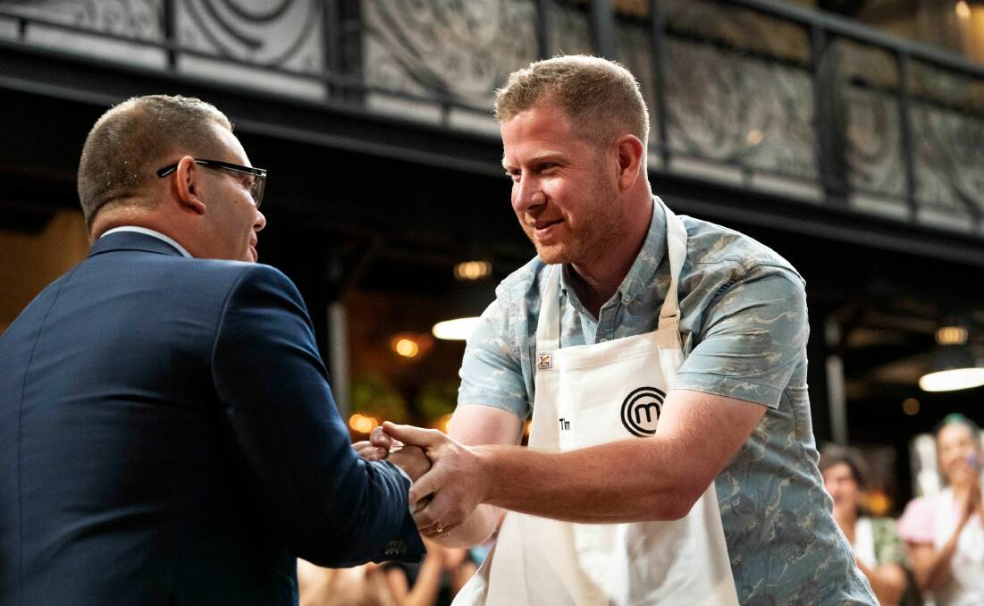 MasterChef judge Gary Mehigan congratulates Tim Bone on winning the Second Chance Cook-Off and resuming his place in the competition.