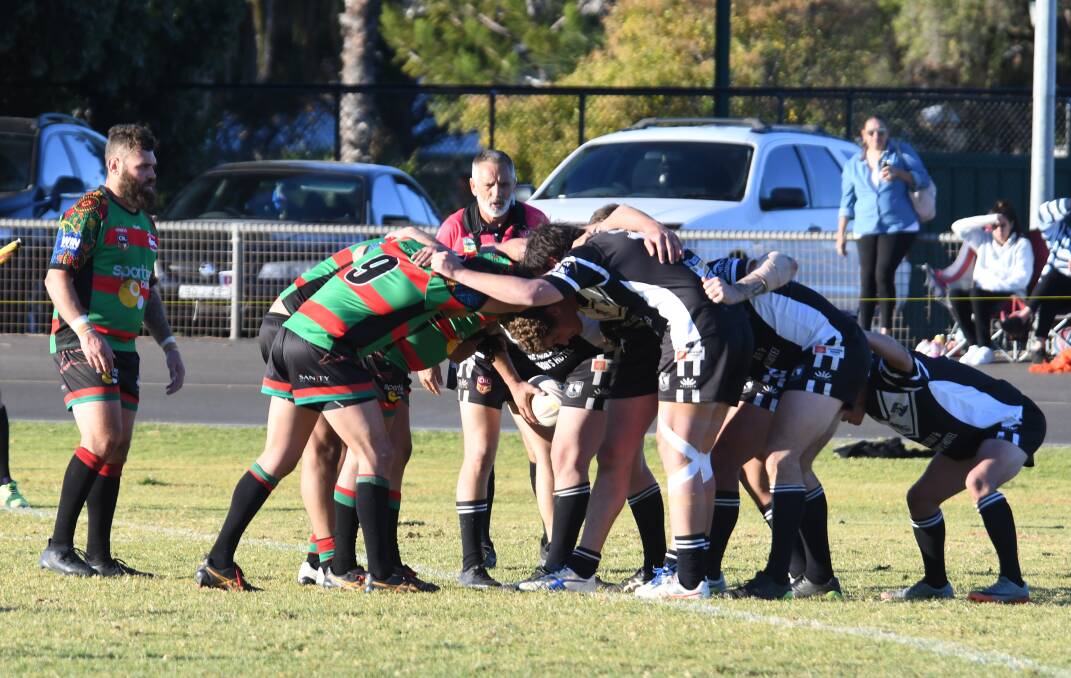 THREE IN THE BIN: Westside's much-depleted scrum packs in with their Forbes counterparts. Photo: AMY MCINTYRE