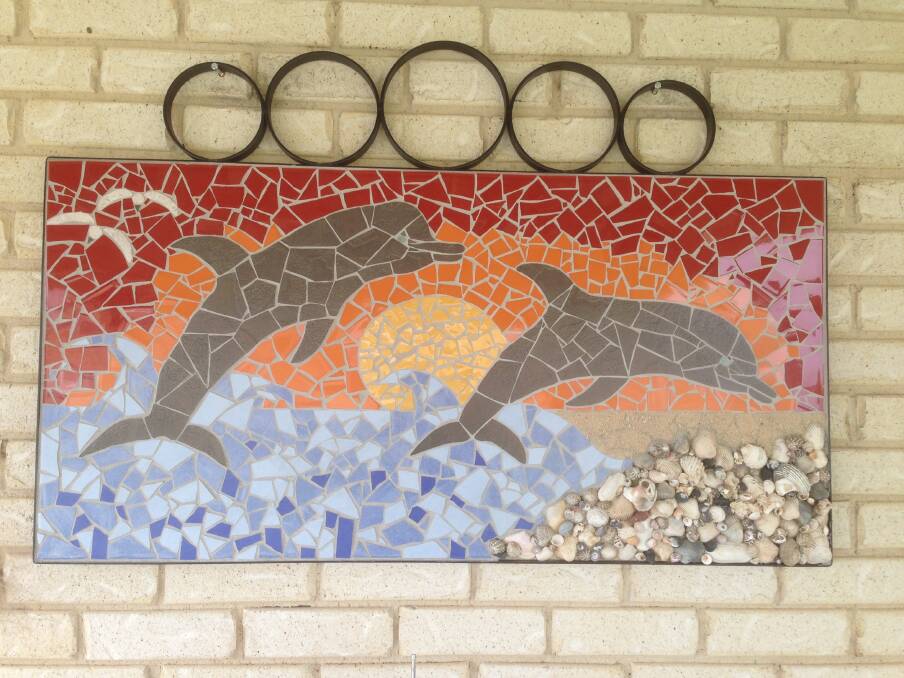 Mosaic Madness: Steward Isabel Haley created this amazing dolphin mosaic. Photo Supplied. 