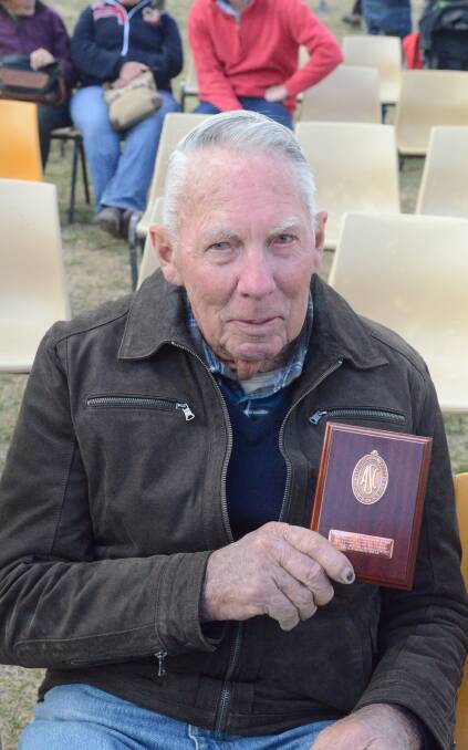 Recognition: Bruce Noble with his 50 years service award. Photo: File.