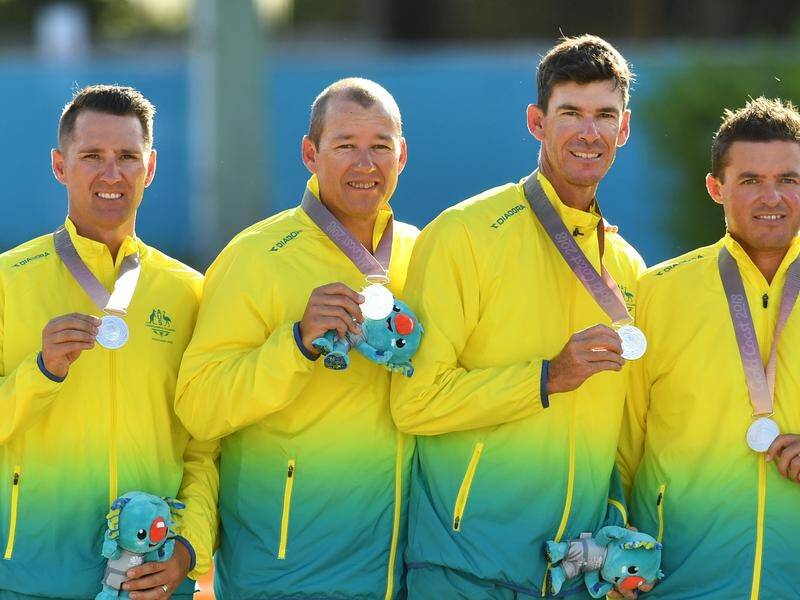 Barrie Lester, (far left) will receive the Commonwealth Games flag at the closing ceremony (Darren England/AAP PHOTOS)