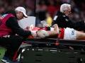 Saints' Hunter Clark being taken off on a stretcher after a collision in their win over the Blues.