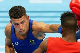 Harry Garside is one of 13 Australian boxers within a fight of earning an Olympic quota spot. (Martin Rickett/AAP PHOTOS)