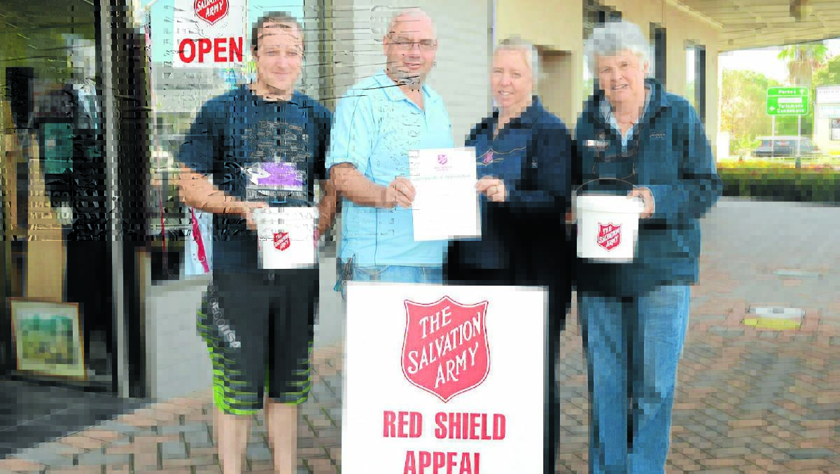 Forbes Salvation Army has reached their goal of $7,000 for this year’s Red Shield Appeal and want to thank the Forbes community for their support. Pictured are volunteers Jamie Benton (left) and Francis Hodges (right) with Salvation Army officers Troy and Donna Munro. 0514redshield(2)