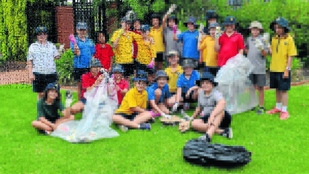 Students at Forbes Public School participated in Clean Up Australia Day on Friday. 0214cleanup(1)