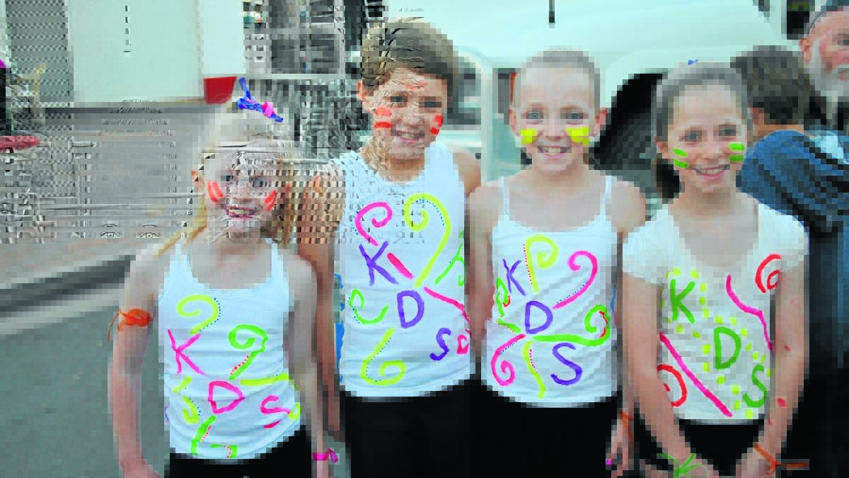 Bronte Bennett, Fletcher Browne, Jenna Redfern and Matilda Crawley performed in the street party at the 2013 festival.  1013festivalfri(5)