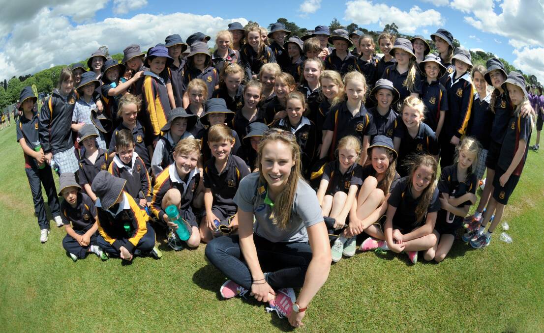 Australian cricketer Ellyse Perry with Scotch Oakburn students in 2014. Picture: Paul Scambler