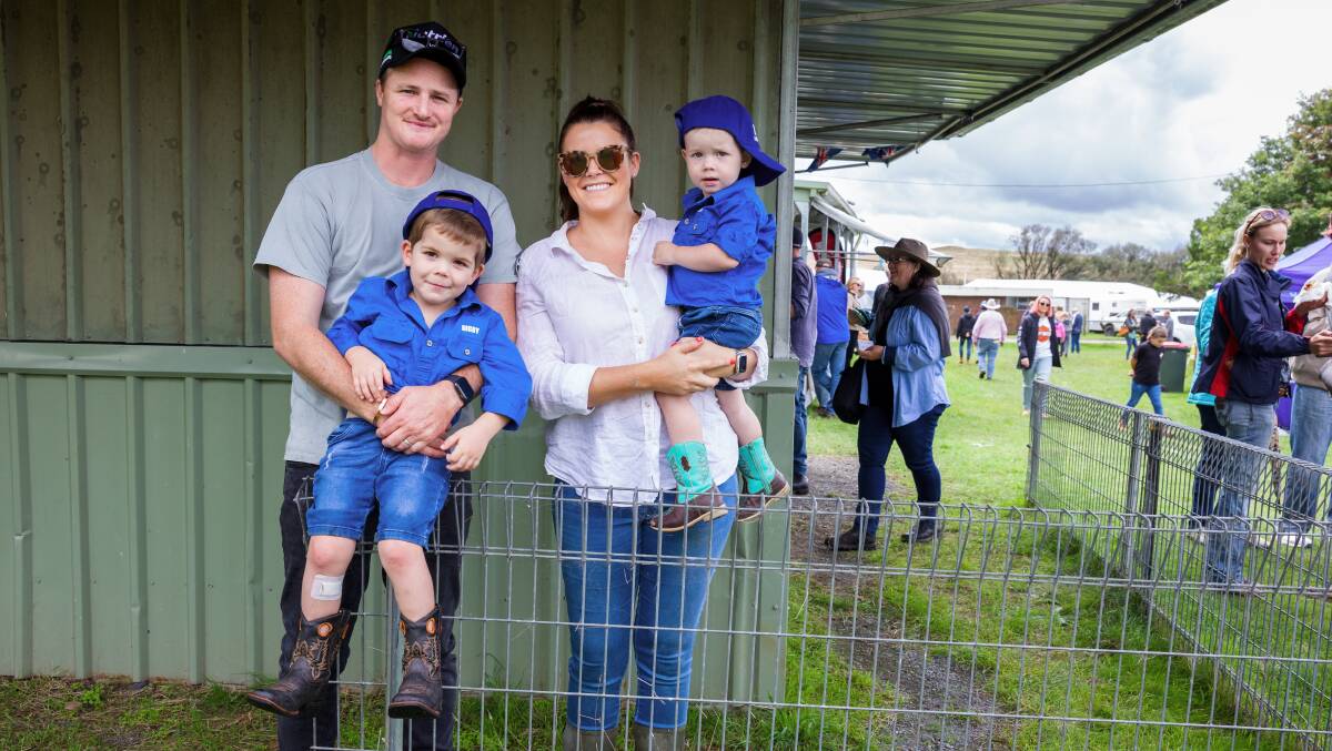 Charlie, and Bec Croker with their children, Finn and Digby, at the Taralga Show. Picture: Sitthixay Ditthavong
