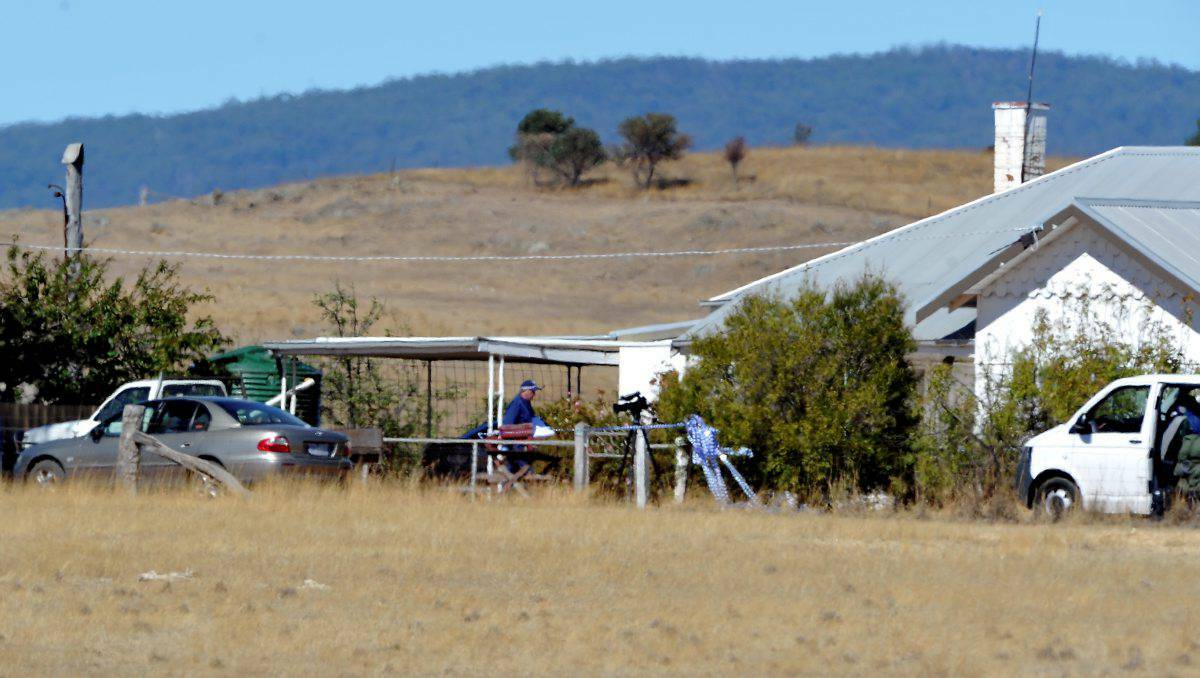 A man has pleaded guilty to the murder of his father and uncle, who were found at this Natte Yallock farm house in March. Photo: LACHLAN BENCE
