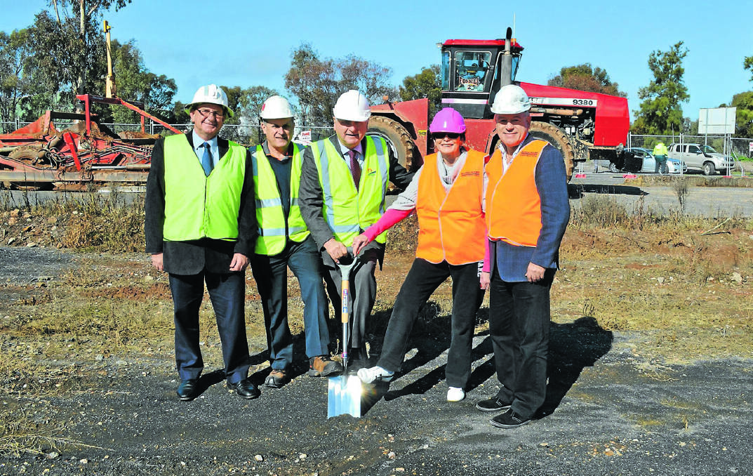 Forbes Shire Council general manager Brian Steffen and councillors Chris Roylance, Ron Penny and Phyllis Miller joined P+I's Grant Hirst in turning the first sod at the Forbes Homemaker Centre site on Wednesday.